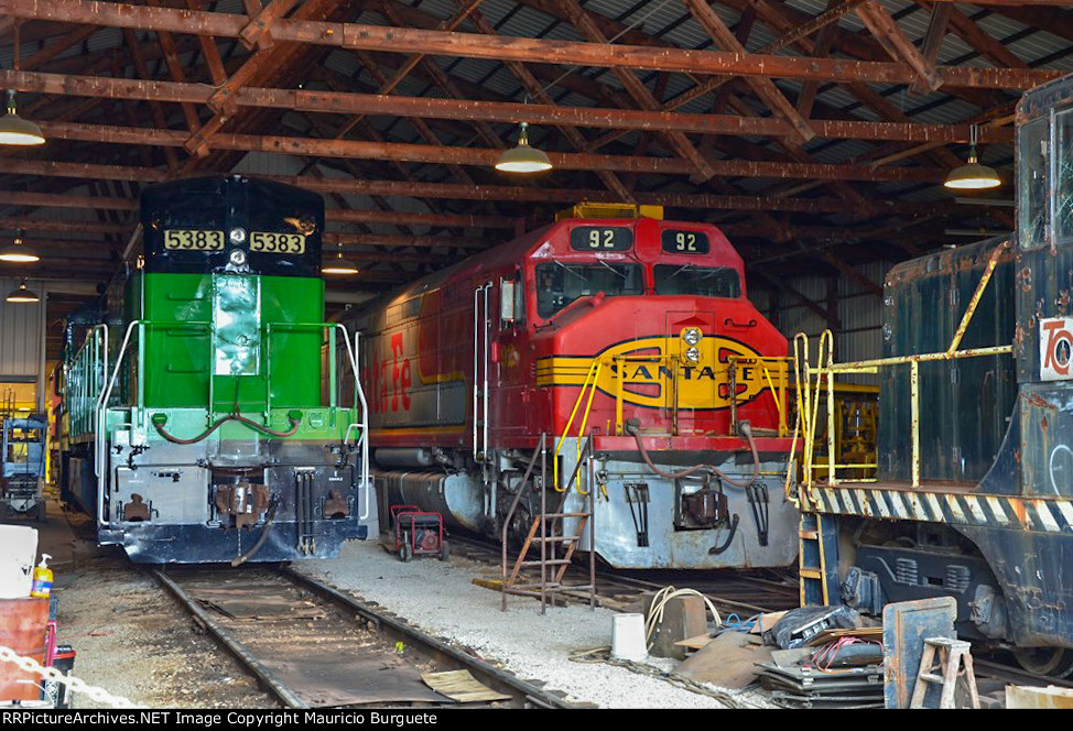 Diesel locomotives inside the barn